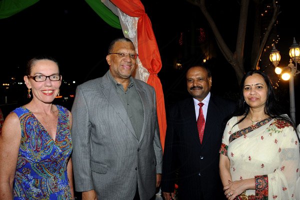 Winston Sill / Freelance Photographer
India High Commissioner to Jamaica Pratap Singh and wife Prem Lata Singh host a reception to mark the occasion of 64th Republic Day of India, held at India House, East King's House Road on Saturday night January 26, 2013. Here are Sandra Phillips (left); Minister Dr. Peter Phillips (second left); High Commissioner Singh (second right); and Prem Lata Singh (right).