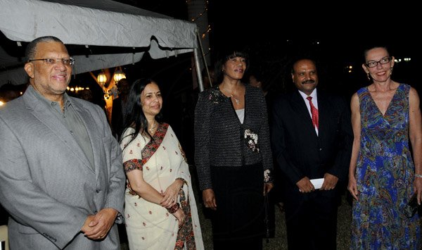 Winston Sill / Freelance Photographer
India High Commissioner to Jamaica Pratap Singh and wife Prem Lata Singh host a reception to mark the occasion of 64th Republic Day of India, held at India House, East King's House Road on Saturday night January 26, 2013. Here are Minister Dr. Peter Phillips (left); Prem Lata Singh (second left); Prime Minister Portia Simpson-Miller (centre); High Commissioner Singh (second right); and Sandra Phillips (right).