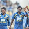 Ricardo Makyn/Staff Photographer
Sri Lanka's players frm left Kumar Sangakara,Angello Mathews Captain celebrate a Wicket against India at Sabina Park on Tuesday 2.7.2013