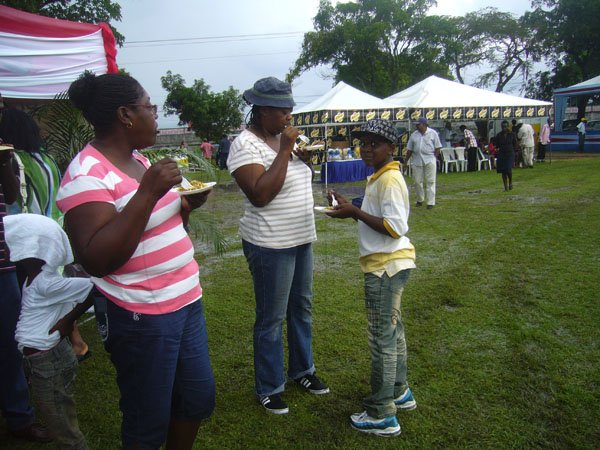 Paul Williams/Gleaner Writer
Roti Festival
Patrons enjoying the food at National Council for Indian Culture in Jamaica's Indian Arrival Day and Roti Festival on Sunday, May 6, at Chedwin Park, St Catherine.