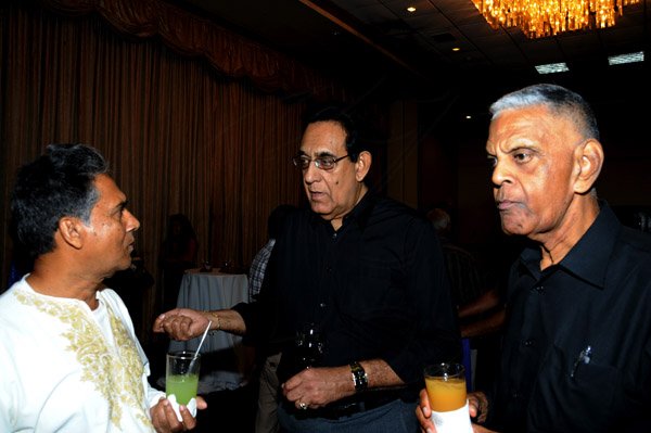 Winston Sill / Freelance Photographer
The National Council for Indian Culture in Jamaica host Cocktail Reception in honour of Vishu Tolan, held at Jamaica Pegasus Hotel, New Kingston on Sunday night March 3, 2013. Here are Lyle Nathan-Sharma (left); Justice --M.---- Dukeran???? (centre);and Seraj Lakasingh?? (right).
