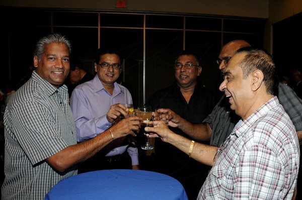 Winston Sill / Freelance Photographer
The National Council for Indian Culture in Jamaica host Cocktail Reception in honour of Vishu Tolan, held at Jamaica Pegasus Hotel, New Kingston on Sunday night March 3, 2013. Here are Nari Williams-Singh (left);Kiran Banhan (second left); Vishu Tolan (third right); Dr. Winston Tolan (second right); and Lachu Ramchandani (right).