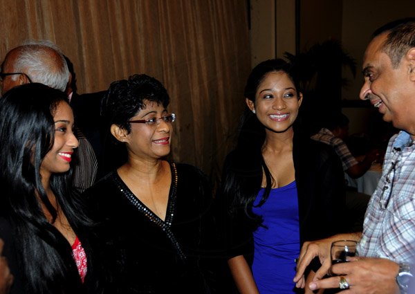 Winston Sill / Freelance Photographer
The National Council for Indian Culture in Jamaica host Cocktail Reception in honour of Vishu Tolan, held at Jamaica Pegasus Hotel, New Kingston on Sunday night March 3, 2013. Here are Chantelle Biersay (left); Charmaine Biersay (second left); Rachelle Biersay (second right); and Lachu Ramchandani (right).
