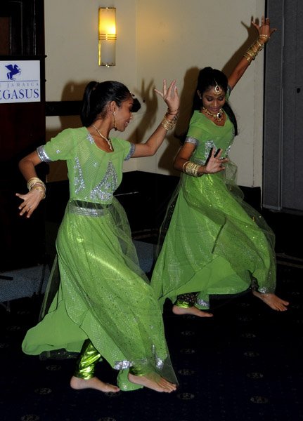 Winston Sill / Freelance Photographer
The National Council for Indian Culture in Jamaica host Cocktail Reception in honour of Vishu Tolan, held at Jamaica Pegasus Hotel, New Kingston on Sunday night March 3, 2013. Here are Biersay sisters, Chantelle (left); and Rachelle (right) performing at the function.