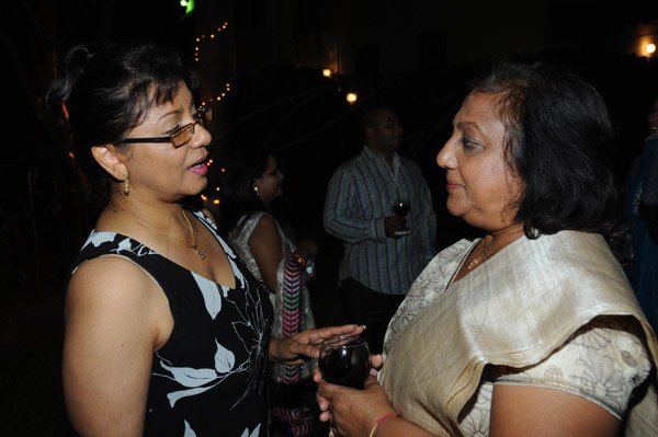 Winston Sill/Freelance Photographer
The Indian Cultural Society in Jamaica and the Indian High Commission host Reception to welcome India Minister of Overseas Indian Affairs- Shri Vayalar Ravi, held at India House, East Kings House Road on Monday night June 17, 2013. Here are Indera Persaud (left); and Merciline Garg (right).