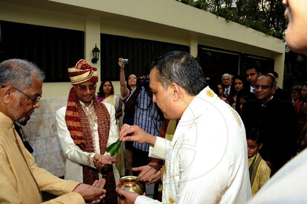 Winston Sill / Freelance Photographer
Indian style wedding ceremony of Jayant Thakura and Shanti Badaloo, held at Mona Visitor's Lodge, UWI Campus on Saturday March 24, 2012.