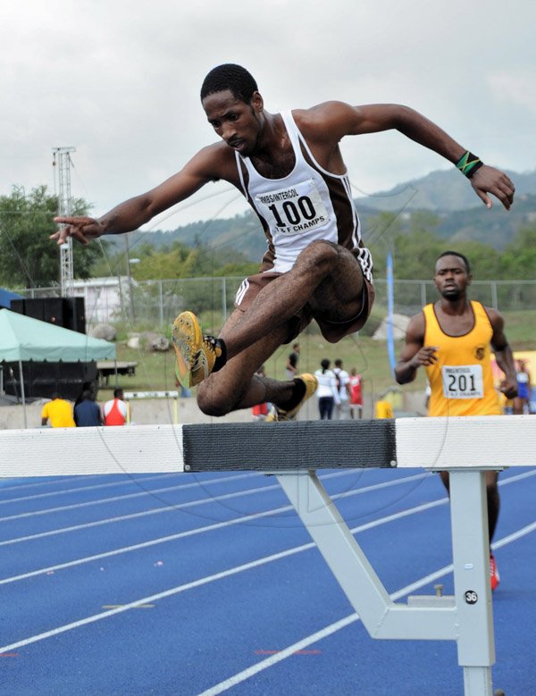 Ian Allen/Staff Photographer
Webster Chung of G.C.Foster College winning the Men 3000m Steeplechase at the VMBS Intercollegiate Track and Field Championships at the UWI/Usain Bolt Track.