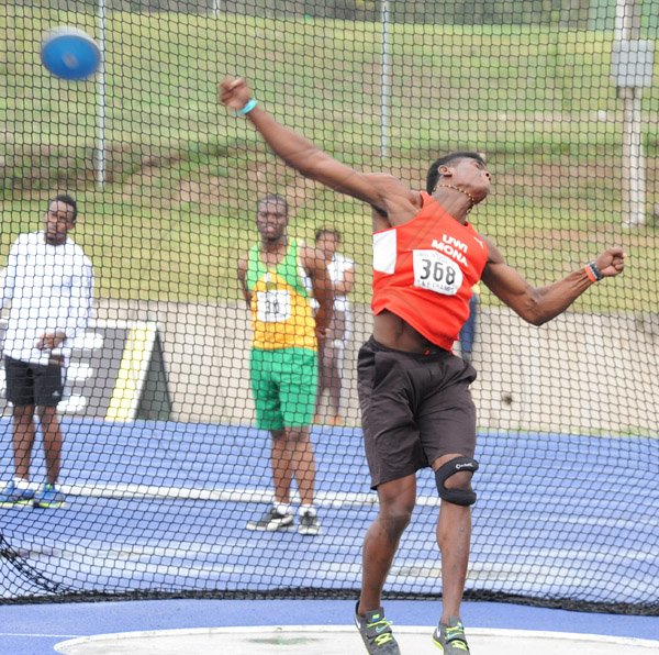 Ian Allen/Staff Photographer
Federick Dacres in the Men Discus at the VMBS Intercollegiate Track and Field Championships 2014 at the UWI/Usain Bolt track.