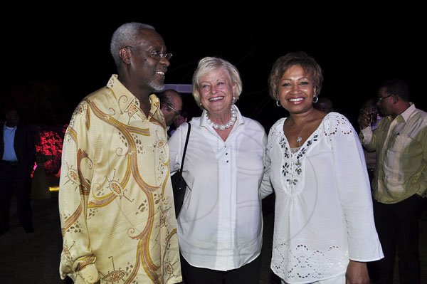 Janet Silvera Photo
 
Former Prime Minister P.J. Patterson (left), Michele Rollins (centre) and Tony Harrison at the final night function of the Jamaica Investment Forum at Rollins' Rose Hall Great House last Thursday night in Montego Bay