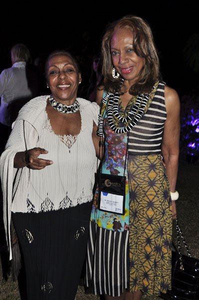 Janet Silvera Photo
 
........(Need name of lady on left) and the first black female on Wall Street, Marianne Spragginz (right), at the final night function of the Jamaica Investment Forum at the Rose Hall Great House last Thursday night in Montego Bay.