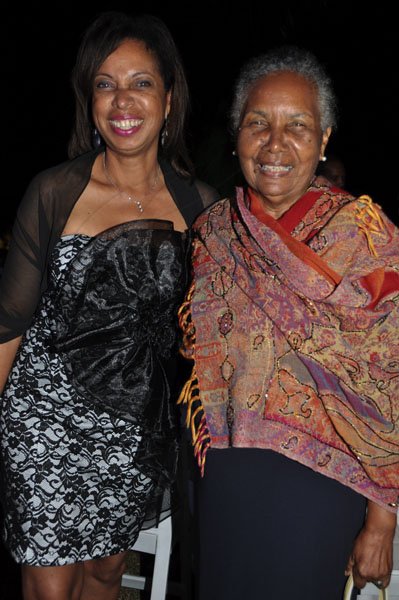 Janet Silvera Photo
 
Minister of State in the Ministry of Industry, Investment and Commerce, Sharon Ffolkes-Abrahams (left) and her mom Greta Ffolkes at the final night function of the Jamaica Investment Forum at the Rose Hall Great House last Thursday night in Montego Bay