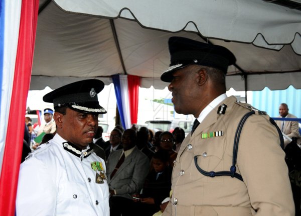 Winston Sill / Freelance Photographer
Island Special Constabulary Force (ISCF) Change of Command Parade for new Commandant James Golding, held at the ISCF Headquarters, Herman Barracks on Saturday October 6, 2012. Here are outgoing Commandant Osmond Bromfield (left); and Commissioner Owen Ellington (right).
