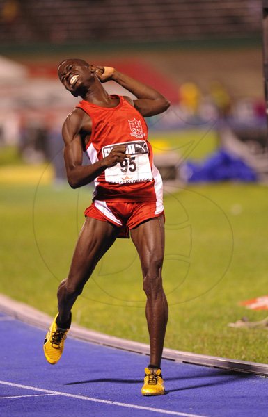 Ricardo Makyn/Staff Photographer
Orane Wint of Bellefield  High wining the Boys'  Class 1  1500 Meters Final   at the Boys and Girls Championships at the National Stadium on Friday 30.3.2012