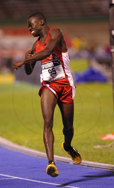 Ricardo Makyn/Staff Photographer
Orane Wint of Bellefield  High wining the Boys'  Class 1  1500 Meters Final   at the Boys and Girls Championships at the National Stadium on Friday 30.3.2012