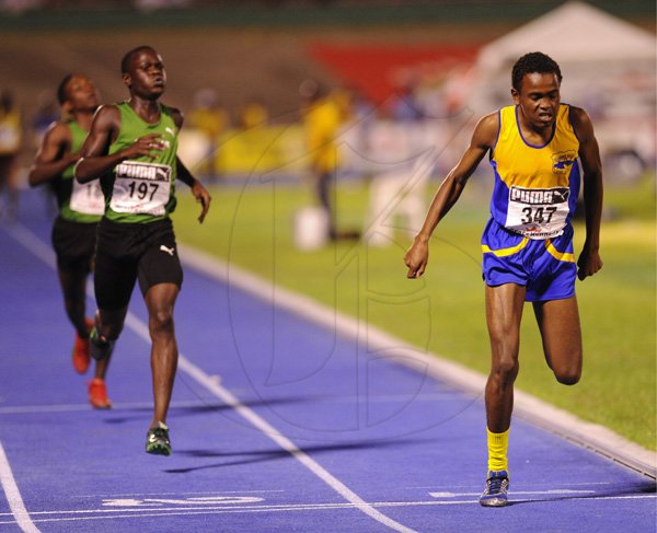 Ricardo Makyn/Staff Photographer
Delano Rochester of Clarendon College  wining the Boys'  Class 2  1500 Meters Final   at the Boys and Girls Championships at the National Stadium on Friday 30.3.2012