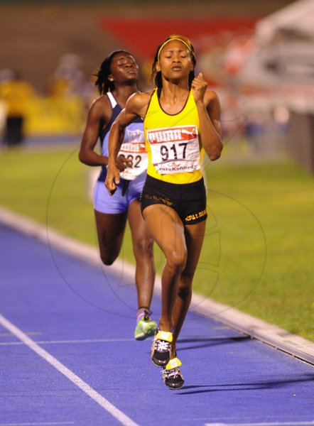 Ricardo Makyn/Staff Photographer
Simoya Campbell of Spalding High wining the Girls   Class 1  Girls 1500 Meters Final   at the Boys and Girls Championships at the National Stadium on Friday 30.3.2012
