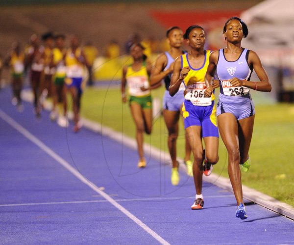 Ricardo Makyn/Staff Photographer
Marleena  Eubanks of Edwin Allen wining the Girls   Class 2  Girls 1500 Meters  Final   at the Boys and Girls Championships at the National Stadium on Friday 30.3.2012