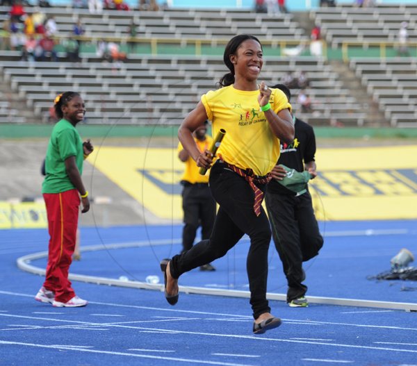 Ricardo Makyn/Staff Photographer
Shaelly-Ann Frazer-Pryce participating in the   openning ceremony  at the Boys and Girls Championships at the National Stadium on Friday 30.3.2012