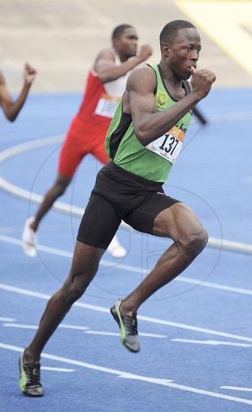 Ian Allen/Photographer
Javon Francis of Calabar High winning heat 4 of the Class 1 Boys 200m on Day 2 of Champs 2013.