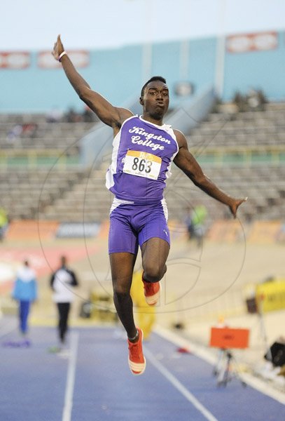 Ian Allen/Photographer
Clive Pullen of Kingston College winning the Class 1 Boys Long Jump at the 2013 Boys and Girls High Schools Atlethic Championships.