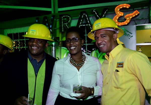 Winston Sill/Freelance Photographer
Beaming with pride with the success of the launch are (from left) Cecil Smith, Alecia Burgess and Gary Dixon. 

Wray and Nephew Limited launch Christmas Promotion, held at Digicel Field, Lady Musgrave Road on Tuesday night October 7, 2014.