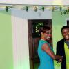 Winston Sill/Freelance Photographer
Wihcon's Aisha Campbell gives Wray and Nephew's Cecil Smith at the unveiling of the model home to be won during the Christmas promotion.