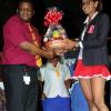 Winston Sill/Freelance Photographer
J Wray and Nephew's Cecil Smith Jnr presents Tanya Lee with the prize for Best School Uniform. 

 Skoolaz party held at the Visitor's Lodge on Wednesday December 7, 2011.