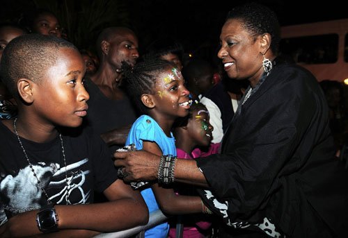 Gladstone Taylor / Photographer
Minister of Youth, Culture and Sports, Olivia Grange greets children on New Year's Eve during Fireworks on the Waterfront, downtown, Kingston.







Waterfront Fireworks show 2012