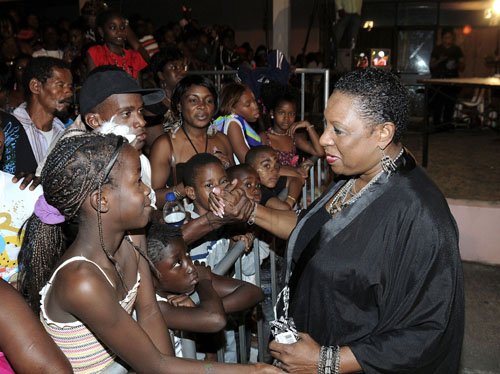 Gladstone Taylor / Photographer
Minister of Youth, Culture and Sports, Olivia Grange greets children on New Year's Eve during Fireworks on the Waterfront, downtown, Kingston.






Waterfront Fireworks show 2012