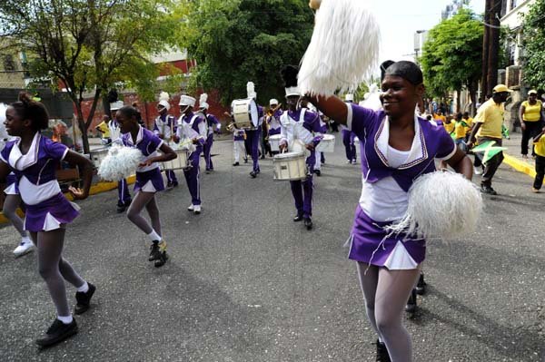 Norman Grindley / Chief Photographer
Members of the Steppers marching band leads the way on Duke Stree,t as they celebrate Jamaica day in Kingston, February 17, 2012.