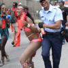 Jermaine Barnaby/Freelance Photographer
A reveller busing a dance on a police officer at Jamaica carnival road march on Sunday April 23, 2017.
