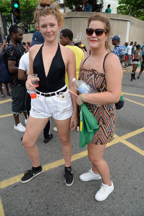 Jermaine Barnaby/Freelance Photographer
Foreign nationals were present taking in the action from revellers at Jamaica carnival road march on Sunday April 23, 2017.