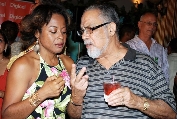 Colin Hamilton/freelance photographer
"We are both Hamiltons", seems to be what Howard Hamilton is saying to Tracy Hamilton at the Jamaica Cricket Festival 2010 Media Launch at the Acropolis Gaming Lounge on Tuesday March 9, 2010.