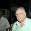 ---business social --

Gladstone Taylor / Photographer
Karl Samuda arrives at the JLP headquater's at Belmont Road loyally dressed in party green and patriotically sporting inked finger signalling he voted.