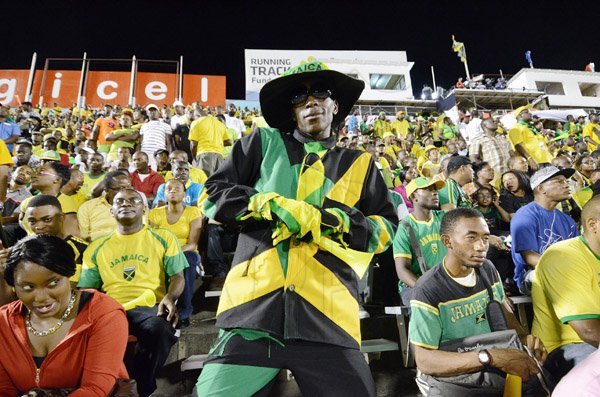 Ricardo Makyn/Staff Photographer                                   Supporters of Jamaica's Regga Boyz fill the stands at the National Stadium as Jamaica faced off against Mexico in a World Cup qualifier last night. See the STAR for full coverage of the match.