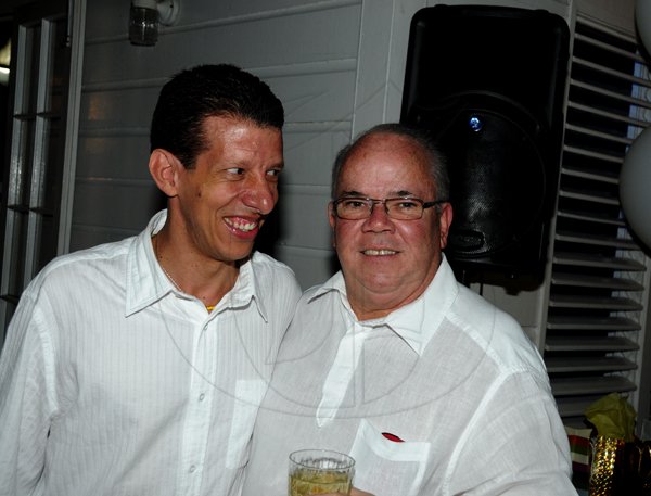 Winston Sill / Freelance Photographer
James Watson celebrates his 40th Birthday in fine style with family and friends with a party, held at Kingston Polo Club, Caymanas Estate on Saturday night November 24, 2012. Here are James Watson (left); and Hugh Croskery (right).