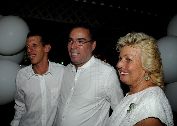 Winston Sill / Freelance Photographer
James Watson celebrates his 40th Birthday in fine style with family and friends with a party, held at Kingston Polo Club, Caymanas Estate on Saturday night November 24, 2012. Here are James (left); Daryl Vaz (centre); and Jeanne Watson (right).