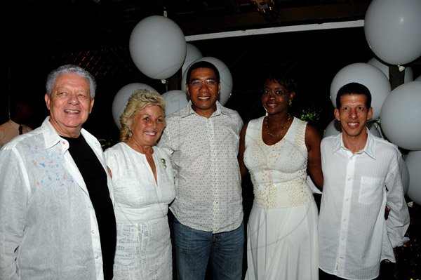 Winston Sill / Freelance Photographer
James Watson celebrates his 40th Birthday in fine style with family and friends with a party, held at Kingston Polo Club, Caymanas Estate on Saturday night November 24, 2012. Here are Anthony Watson (left); Jeanne Watson (second left); Andrew Holness (centre); Juliet Holness (second right); and James Watson (right).