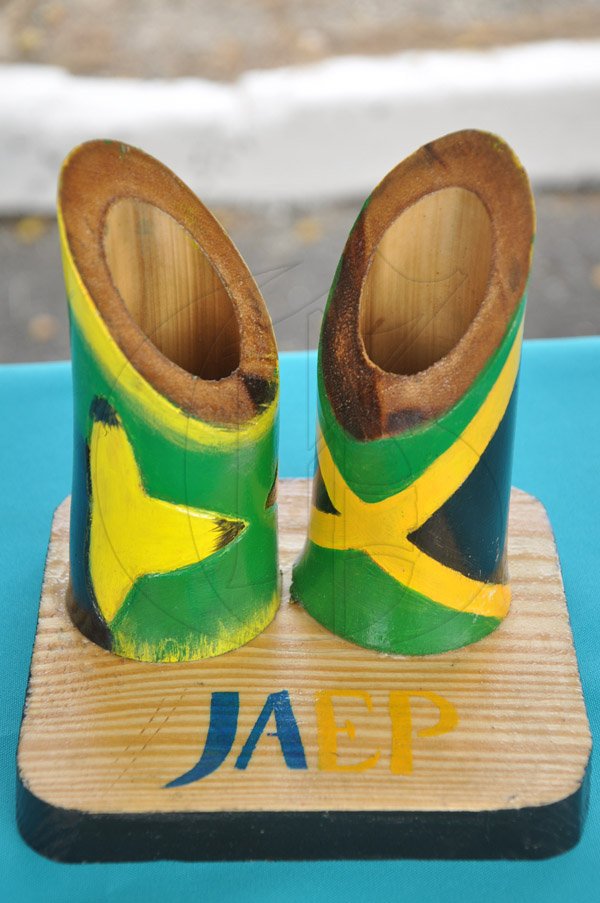 Jermaine Barnaby/Photographer
An hand crafted piece done by students of St Elizabeth Technical High School STETHS showing off the Jamaican colours at the Jampreneurs Expo & Summer Jam at the  Ranny Williams Entertainment Centre on  Saturday, July 5, 2014.