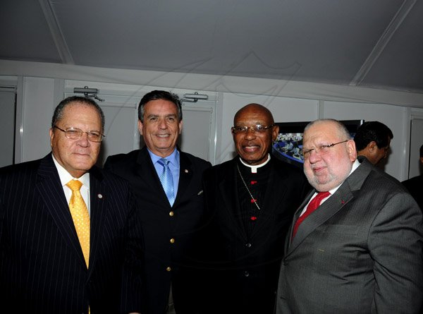 Winston Sill / Freelance Photographer
JAMPRO host welcome dinner for visiting Directors  of the World Federation of Consuls, held at Spanish Court Hotel, St. Lucia Avenue on Thursday night January 24, 2013. Here are Arnold Foote (left), President, World Federation of Consuls; Thomas Amaral Neves (second left); Bishop Don Taylor (second right); and M. Aykut Eken (right).