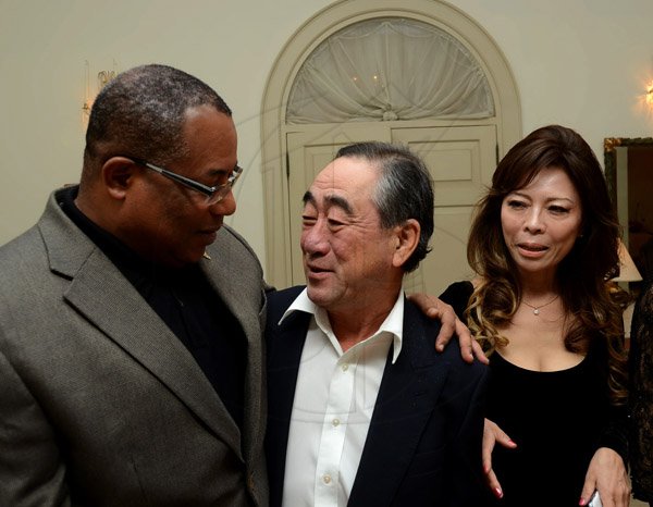 Winston Sill/Freelance Photographer
Outgoing Japanese Ambassador Yasuo Takase, his wife Sayoko Takase and daughter Yuria Takase host a Reception and Dinner for some of their close and special jamaican friends, held at Seaview Avenue on Friday night March 20, 2015. Here are Anthony Hylton (left), Minister of Industry, Investment and Commerce; Ambassador Takase (centre); and Sayoko Takase (right).