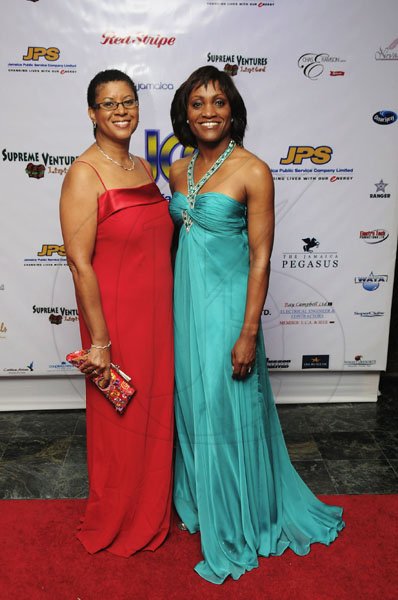 Contributed
Jeanette Lewis PR Manager and Beverley Thompson Director, Residential Sales at Flow show off beautiful gowns and charming smiles the JCC's Charity Ball held at the Jamaica Pegasus Hotel on Saturday November 5, 2011.
