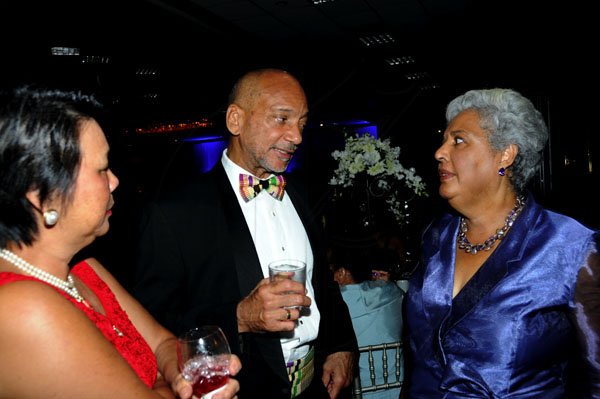 Winston Sill / Freelance Photographer
GraceKennedy's Douglas Orane raps with Christine Johnston (left) and Marjory Kennedy.

The Civic Affairs Committee of the Jamaica Chambern of Commerce 30th annual Grand Charity Ball, held at the Jamaica Pegasus Hotel, New Kingston on Saturday night November 5, 2011.