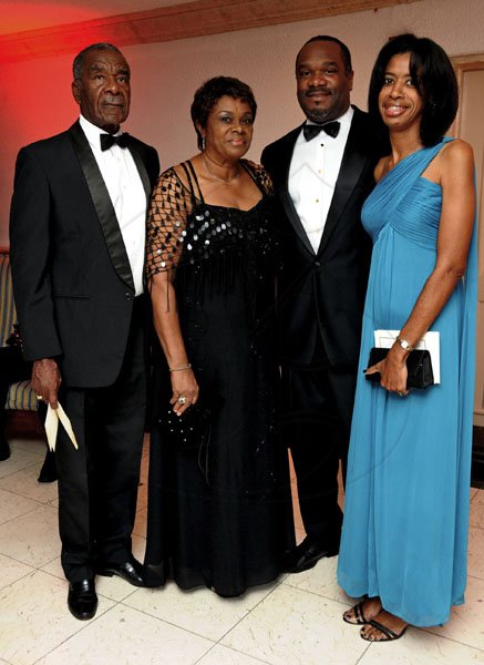 Winston Sill / Freelance Photographer
NCB's Winston Lawson (second right) and wife Camille (right), get the Kodak moment treatment with his parents Winston Lawson Snr. and Joyce Lawson.

***************************************

 The Civic Affairs Committee of the Jamaica Chambern of Commerce 30th annual Grand Charity Ball, held at the Jamaica Pegasus Hotel, New Kingston on Saturday night November 5, 2011.