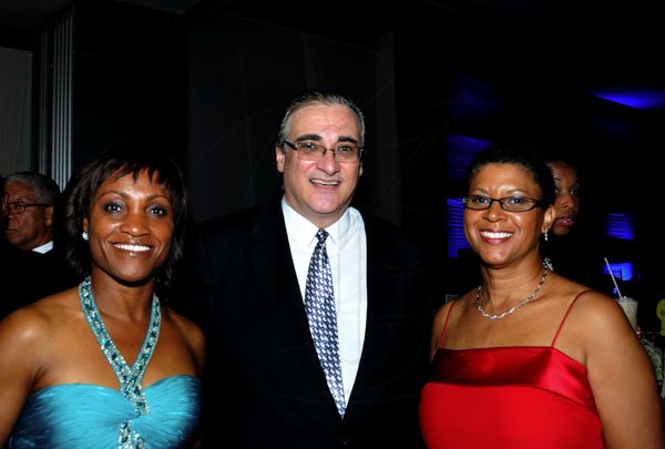 Winston Sill / Freelance Photographer
Going with the 'flow'! Flow executives (from left) Beverley Thompson, Andrew Fazio and Jeanette Lewis are picture perfect.

The Civic Affairs Committee of the Jamaica Chambern of Commerce 30th annual Grand Charity Ball, held at the Jamaica Pegasus Hotel, New Kingston on Saturday night November 5, 2011.