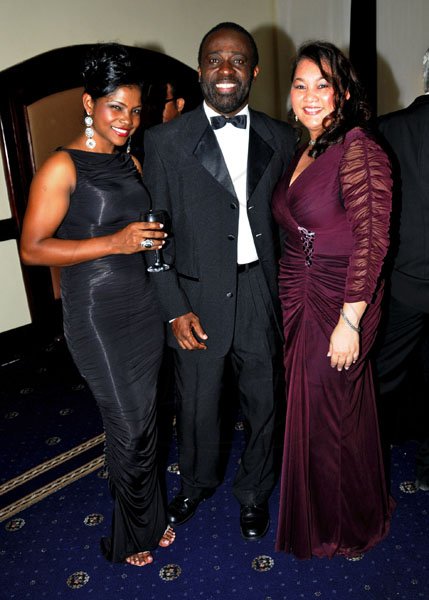 Winston Sill / Freelance Photographer
Entertainer Lloyd Lovindeer is sandwiched by Nerisha Natten (left) and Paulette Chen.



The Civic Affairs Committee of the Jamaica Chambern of Commerce 30th annual Grand Charity Ball, held at the Jamaica Pegasus Hotel, New Kingston on Saturday night November 5, 2011.