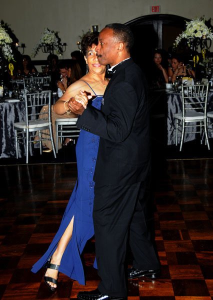 Winston Sill / Freelance Photographer
President of the Jamaica Chamber of Commerce Milton Samuda and wife Elizabeth 'rent a tile'.

The Civic Affairs Committee of the Jamaica Chambern of Commerce 30th annual Grand Charity Ball, held at the Jamaica Pegasus Hotel, New Kingston on Saturday night November 5, 2011.