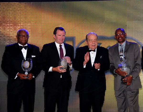 Winston Sill / Freelance Photographer
Jamaica Chamber of Commerce (JCC) 31st Annual Awards Ceremony, held at the Jamaica Pegasus Hotel, New Kingston on Thursday night March 21, 2013. Here are Glen Christian (left), of Cari-Med; ---??? (second left), of Prism Services Inc.; Francis Kennedy (second right), President, JCC; and Karl Domville?? (right), of Seprod Limited.