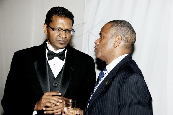 Winston Sill / Freelance Photographer
The Jamaica Chamber of Commerce (JCC) Civic Affairs Committee annual Grand Charity Ball, held at the Jamaica Pegasus Hotel, New Kingston on Saturday night November 3, 2012. Here are Richard Pandohie (left); and Stephen Bell (right).