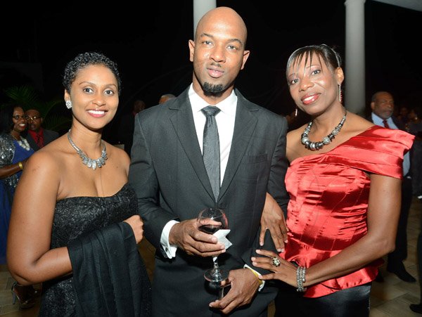 Rudolph Brown/Photographer
 Adrian Thomas pose with Audrey Tulloch, (left) and Sweelien Blackman at the JCCUL 72nd anniversary Dinner and awards Banquet at the Ritz Carlton on Saturday, May 17, 2013